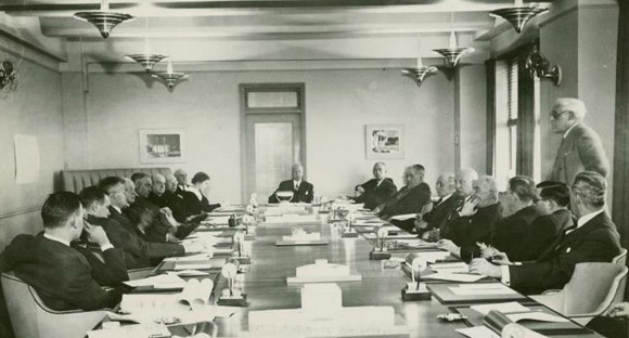 Historic photograph of business meeting